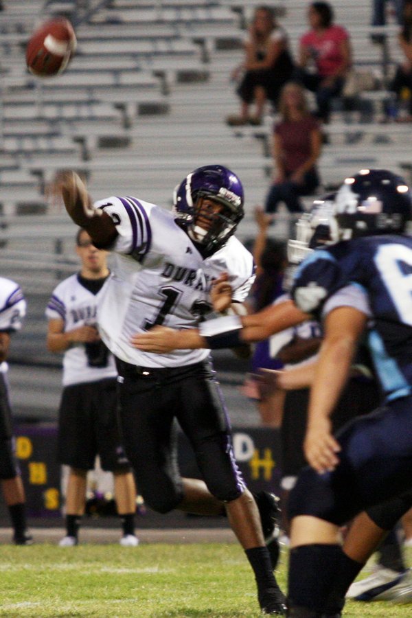 Durango running back Thomas Flanagan throws the ball toward a ...