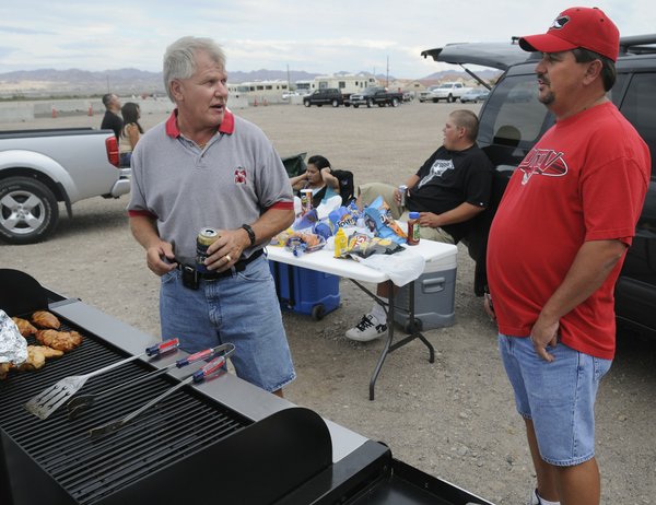 Donnie Stevensen, left, talks football with Jeff Craig during a ...