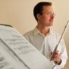 Alexander Viazovtsev, trained in music in Russia and the United States, uses his apartment living ro