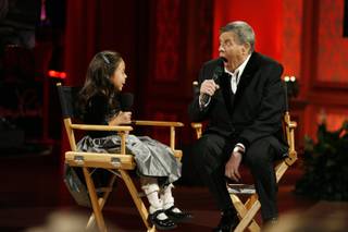 Entertainer Jerry Lewis jokes with Abbey Umali, 9, the 2008 MDA national goodwill ambassador, during the 43rd annual MDA Labor Day telethon at the South Point hotel-casino on Monday.
