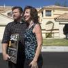 Real estate agents Paul and Teresa McCormick say the Nehemiah program has kept them afloat during th