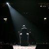 Rep. Ron Paul addresses a huge crowd of supporters Tuesday in Minneapolis, on the other side of the 