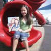 Ten-year-old Brooke Peet holds up the August/September issue of 
