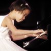 John Vanderburg Elementary School student Rachel Zhang, 8, plays a piece during the sixth annual talent competition at Suncoast Hotel and Casino. Zhang won first place at the competition last Thursday.