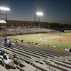 A smattering of fans watch from the stands during a game between the Las Vegas 51s and the Memphis R