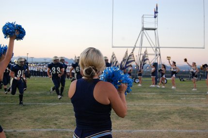 The Foothill High School cheerleaders welcome the Falcons to the field before the game on Friday night. 