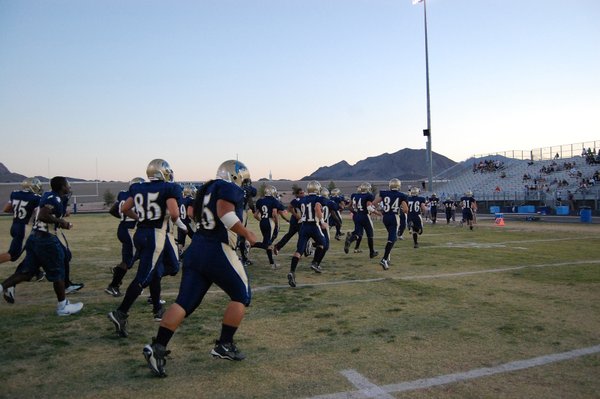 The Foothill High School Falcons enter the field, ready to ...