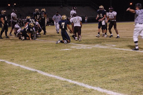 Foothill's Connor Afoa, a senior wide receiver, gets up after ...