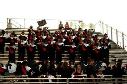 The Chaparral marching band performs in the stands during Friday night's game against Del Sol High School.