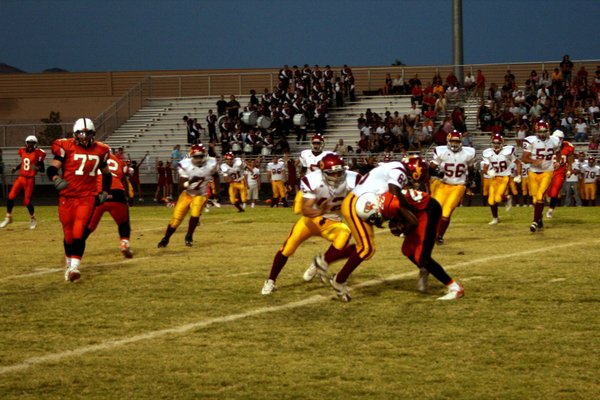 Del Sol's Tayiib Dauda takes down Chaparral's Pierre Jones during ...