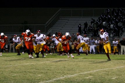 Del Sol quarterback Saei Huihui looks for an open receiver during Friday's game at Chaparral.