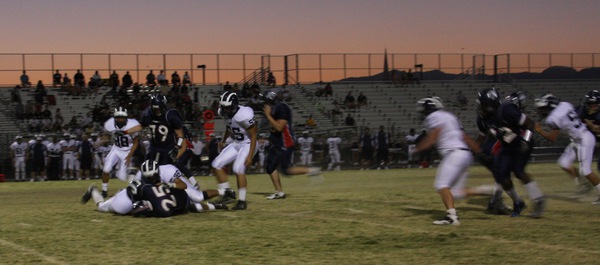Coronado running back No. 25 Austin McKenna is taken down ...