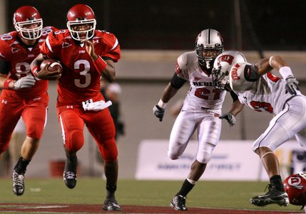 Utah quarterback Brian Johnson darts for 19 yards to the UNLV 41 to help set up the drive when the Utes scored.