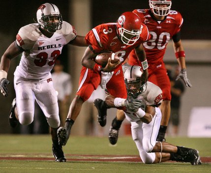 Utah quarterback Brian Johnson runs 19 yards to the UNLV 41 to help set up a touchdown. 