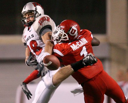 UNLV wide receiver Ryan Wolfe tries to break up a pass in the fourth quarter. 