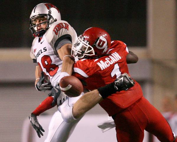 UNLV wide receiver Ryan Wolfe tries to break up a ...
