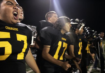 Chris Tran, left, of Clark High School cheers after their pulled ahead of Rancho High School in the fourth quarter their game at Clark High School in Las Vegas  Friday, September 5, 2008. Rancho won the game 21-20 with a two-point conversion in the last 60 seconds.