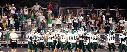 Rancho High School fans and players cheer after scoring the two-point conversion that won them the game at Clark High School in Las Vegas  Friday, September 5, 2008. Rancho won the game 21-20 with that play in the last 60 seconds.