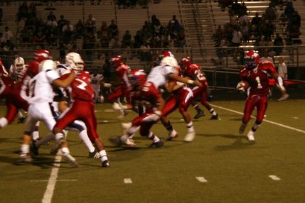 Valley's Garis Wharton, a track star, runs the ball during the third quarter of Friday's game against Liberty.