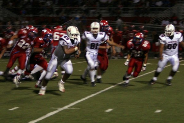 Liberty running back Nua Sage runs the ball during Friday's ...