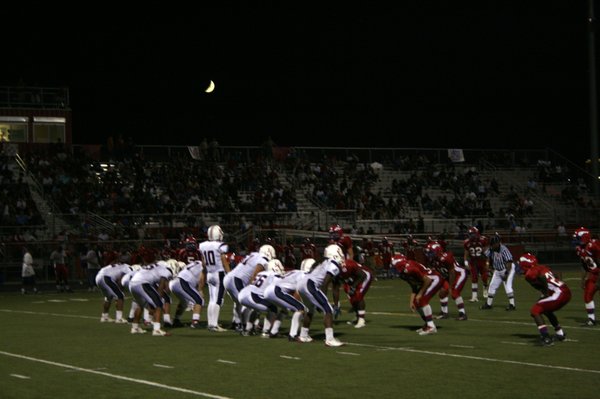The Liberty Patriots and the Valley Vikings line up during ...