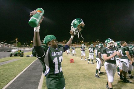 Green Valley wide receiver Derrick Stevens celebrates after his team completed an extra point after a touchdown he scored during a home game against Centennial on Friday night.