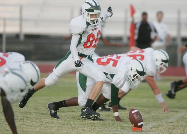 Mojave's kicker Christopher Gorles starts off the game against Silverado ...