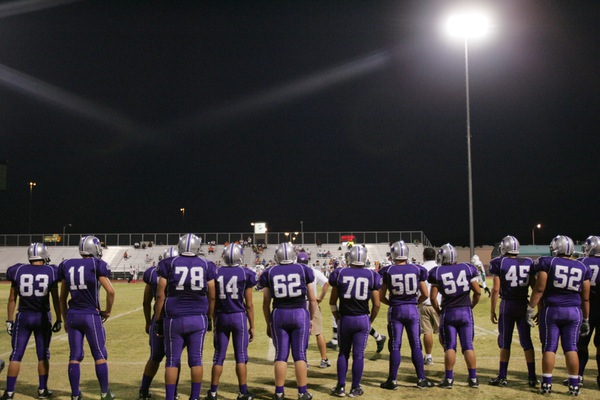 Silverado players look from the sidelines during a home game ...