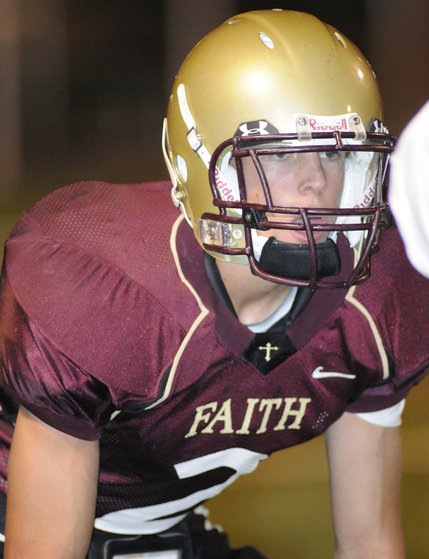 Faith Lutheran defensive back A.J. Finlayson stares down a Spring Creek receiver before the snap during a home game on Friday night.