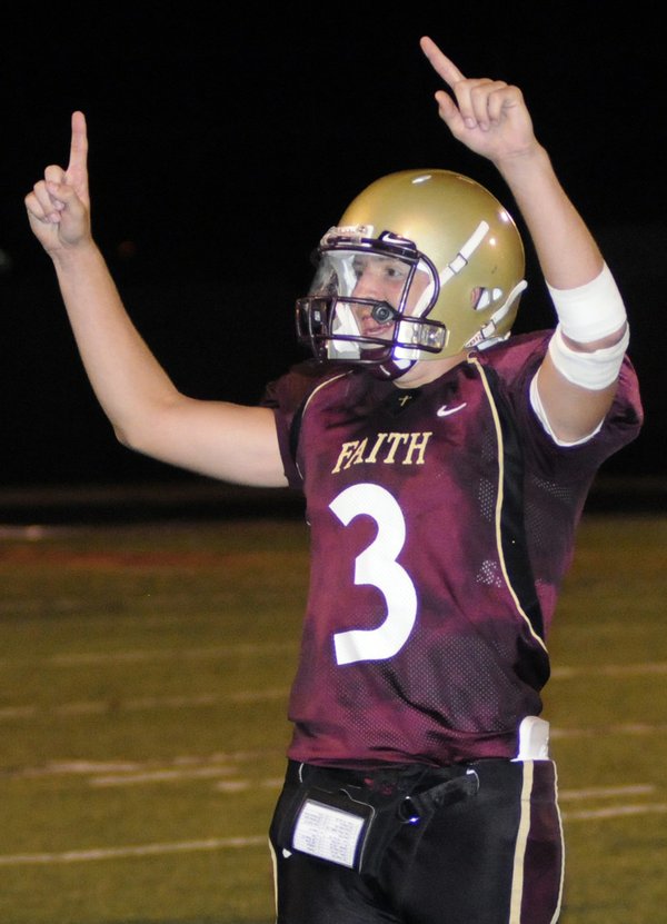 Faith Lutheran quarterback Joe Portaro shouts as he celebrates a ...