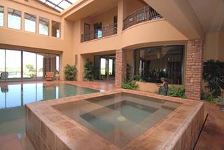 A view of the indoor pool and hot tub at Fred Segal's house.