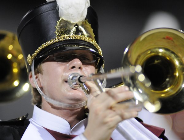 Del Sol junior Dylan Musso plays the trombone during halftime ...