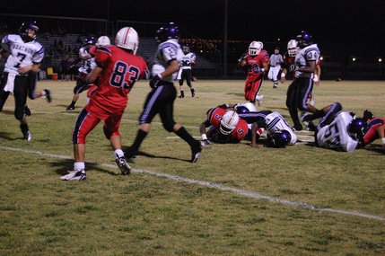 Durango's defense takes down Liberty freshman Ty Berg.  Liberty defeated Durango on Friday night, 35-7.
