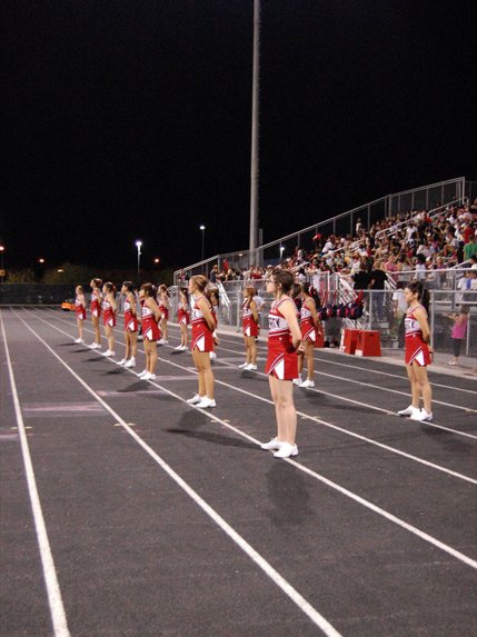 Liberty cheerleaders watch from the sidelines at Friday night's game. 