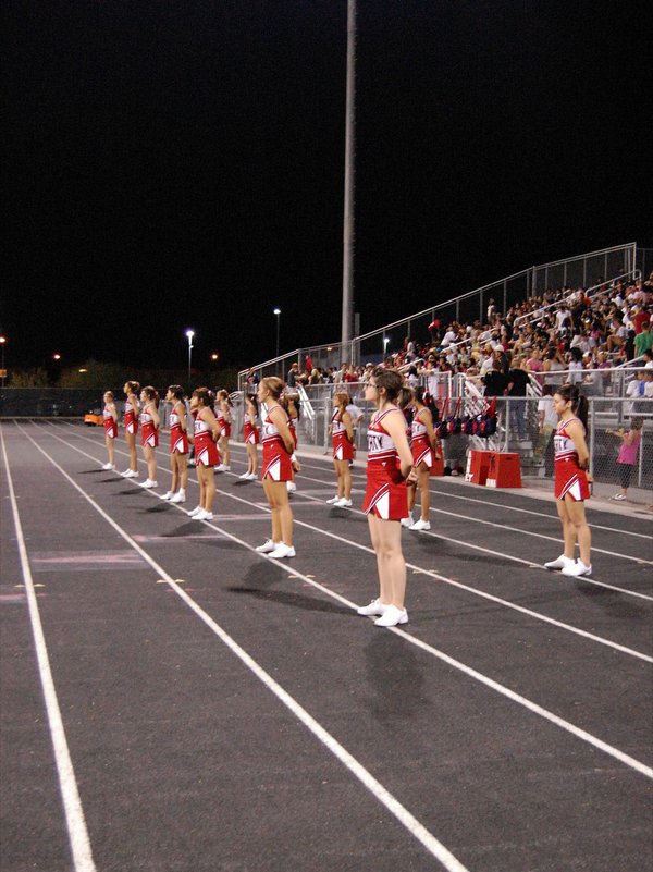 Liberty cheerleaders watch from the sidelines at Friday night's game.