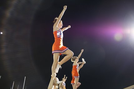 Bishop Gorman cheerleaders pump up the crowd during the third quarter of Friday's game against Dixie, Utah. Bishop Gorman was ahead 14-6 in the third quarter.