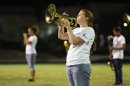 Nia Jennings performs with the Boulder City Marching Band during halftime at the Boulder City High School football home opener against River Valley of Mohave, Ariz.