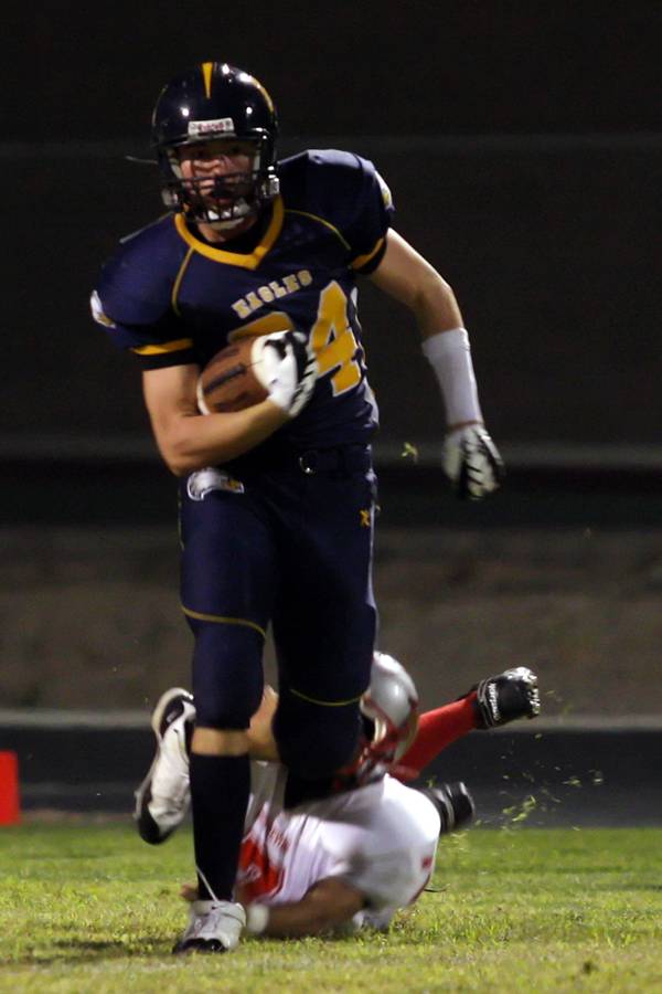 Boulder City linebacker Jeremy Smith makes a run to avoid ...