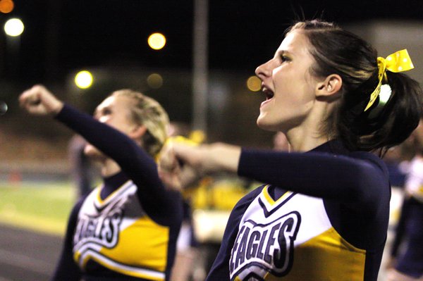 Boulder City High School cheerleader Jennifer Adams, right, cheers on ...