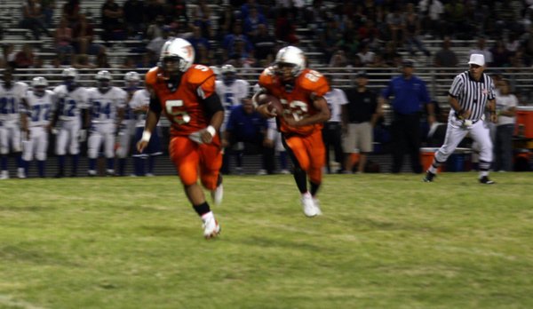 Chaparral's Padric Hall (5) blocks for Isaiah Washington during Friday's ...