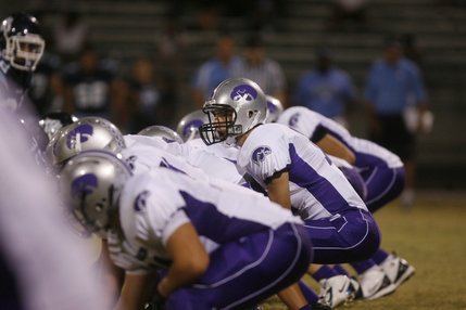 Silverado quarterback Kyle Simmons (12) calls a play during an away game against Centennial Friday night.