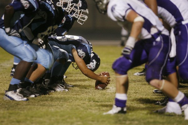 Centennial's special teams unit lines up for an extra point ...
