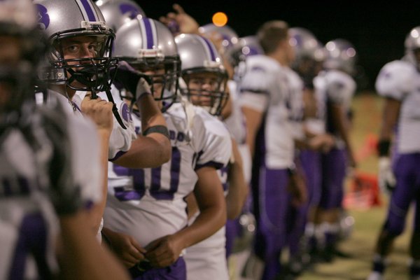 Silverado players look on from the sidelines during an away ...