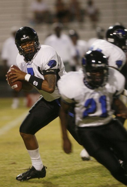 Desert Pines quarterback Dalton Leilua (7)  throws a pass during an away game against Cimarron-Memorial Friday night.