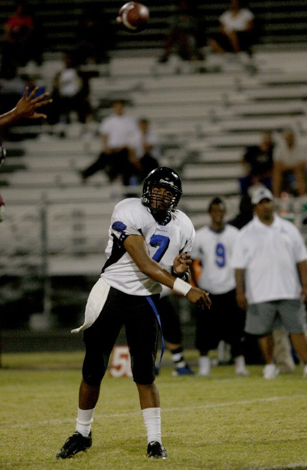 Desert Pines quarterback Dalton Leilua (7) throws a pass during ...