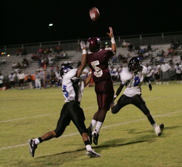 Cimarron-Memorial wide receiver Kevin Bansbach (5), jumps for a catch ...