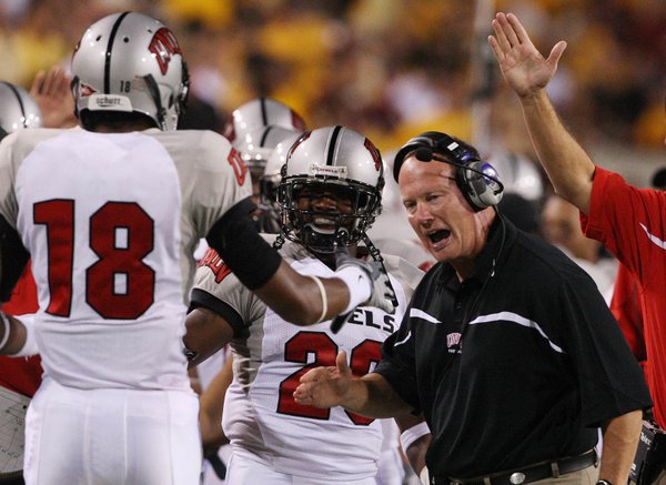 UNLV receiver Phillip Payne (18) celebrates with head coach Mike ...