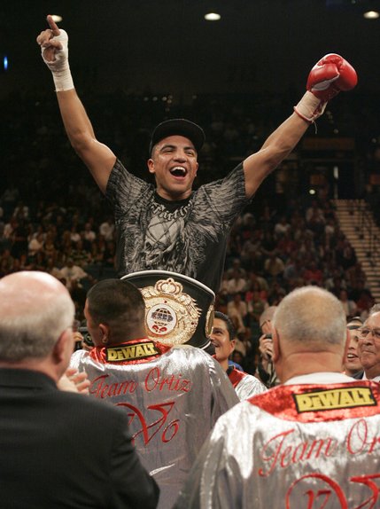 U.S. boxer Victor Ortiz celebrates his victory over Roberto Arrieta of Argentina during their NABO junior welterweight fight at the MGM Grand Garden Arena Saturday. Golden Boy promoter Oscar De La Hoya praised the young boxer before and said Ortiz will be the next great champion.