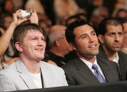 Boxers Ricky Hatton (left) and Oscar De La Hoya share a conversation before the Joel Casamayor versus Juan Manuel Marquez title fight at the MGM Grand Garden Arena in Las Vegas on Saturday night.