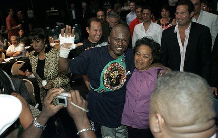 Vernon Forrest of Atlanta celebrates with fans after his victory over WBC super welterweight champion Sergio Mora of Los Angeles during their title rematch at the MGM Grand Garden arena. Forrest regained the title he had lost to Mora from a fight in June with a 12-round unanimous decision.